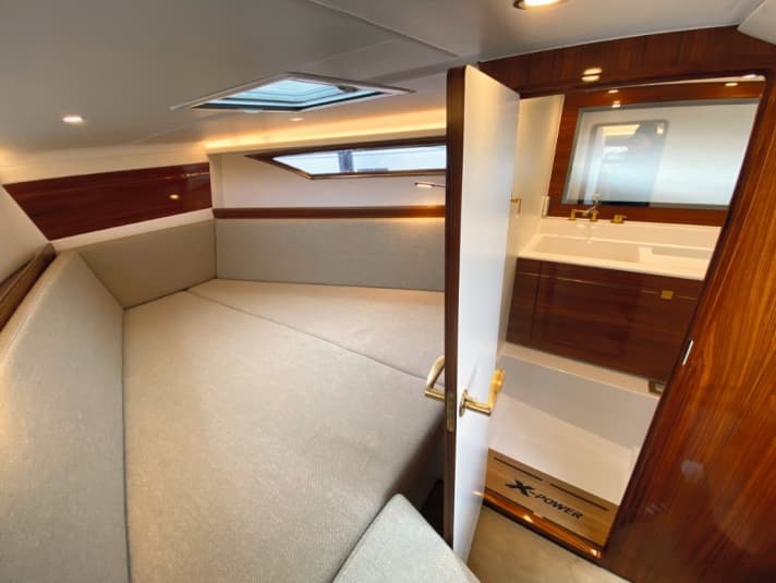 The 33C has a large cabin for a weekender. The walnut woodwork is impressive. The "Magic Mirror" allows a view to the outside at the touch of a button