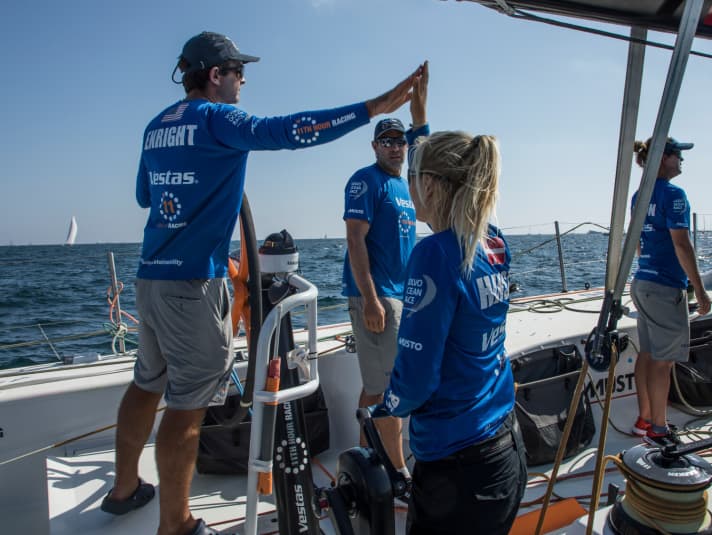   The first leg went perfectly for Charlie Enright's Vestas 11th Hour Racing. Mainly thanks to the outstanding decision-making skills of navigator Simon "Sifi" Fisher (centre)