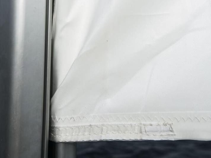 Careful rolling in and out and support by hand helps more than force if the large is stuck