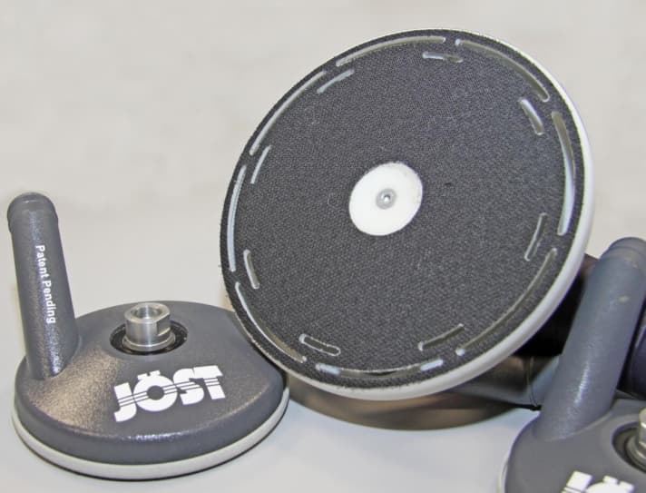   The slots on the edge of the disc are designed to catch the sanding dust