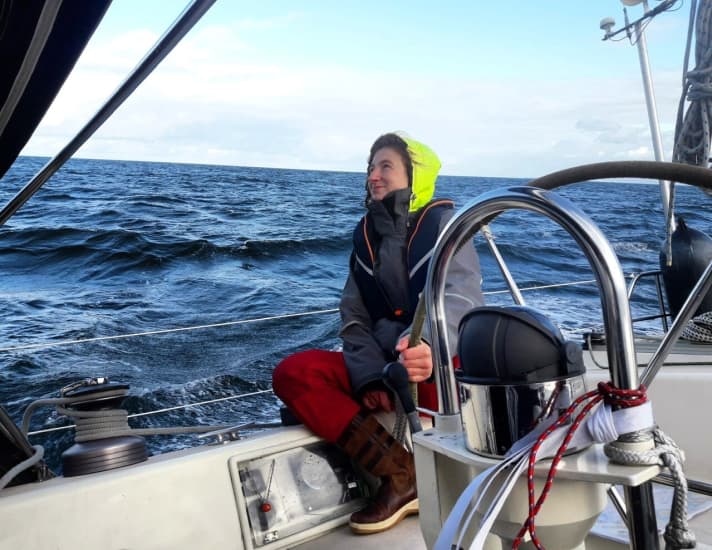   The young skipper at the helm of the Moody, which she is about to set sail with