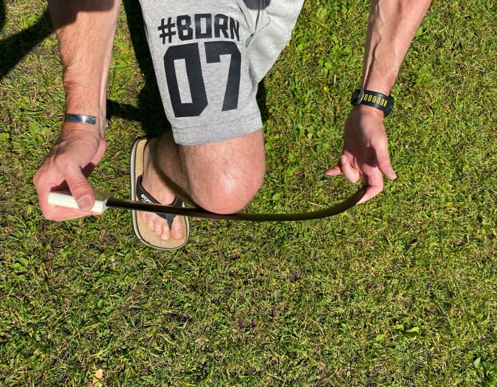If a fin can be bent like this with two fingers on land, you can imagine what happens under water - if you press against it with all your leg strength.