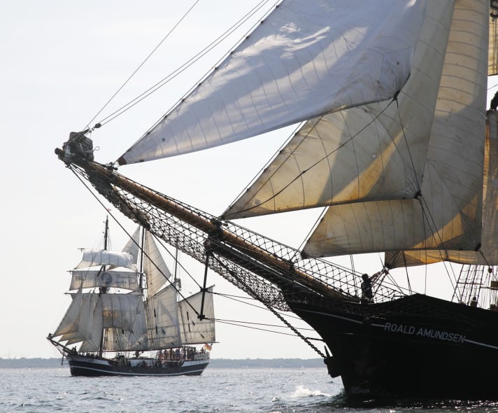 Two traditional ships underway: "Thor Heyerdahl" (l.) and "Roald Amundsen"