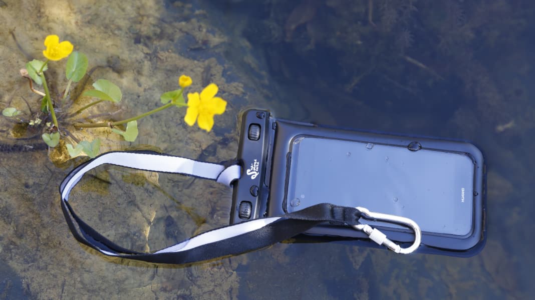 Waterproof mobile phone case It even floats in the pond. SURF