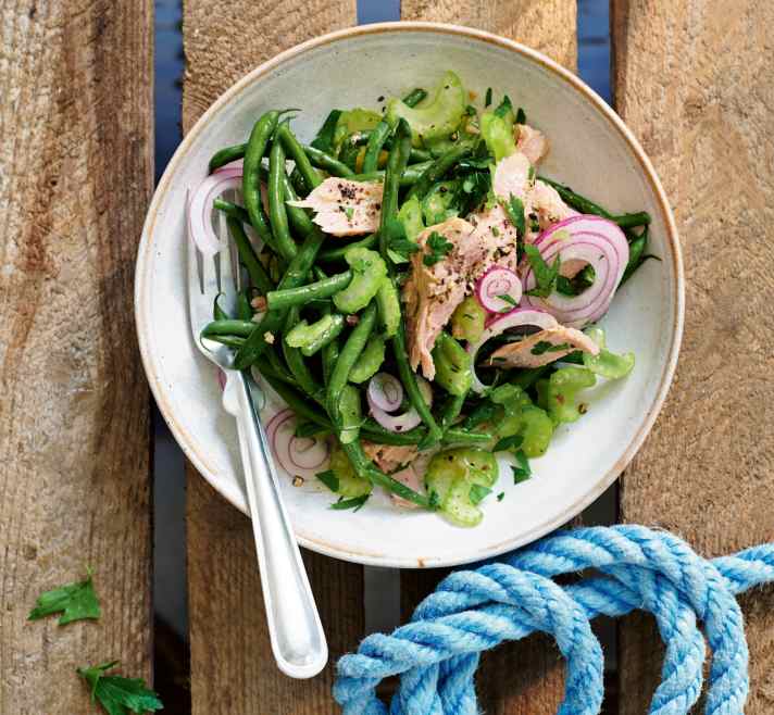 Bean salad with tinned tuna and celery stalks