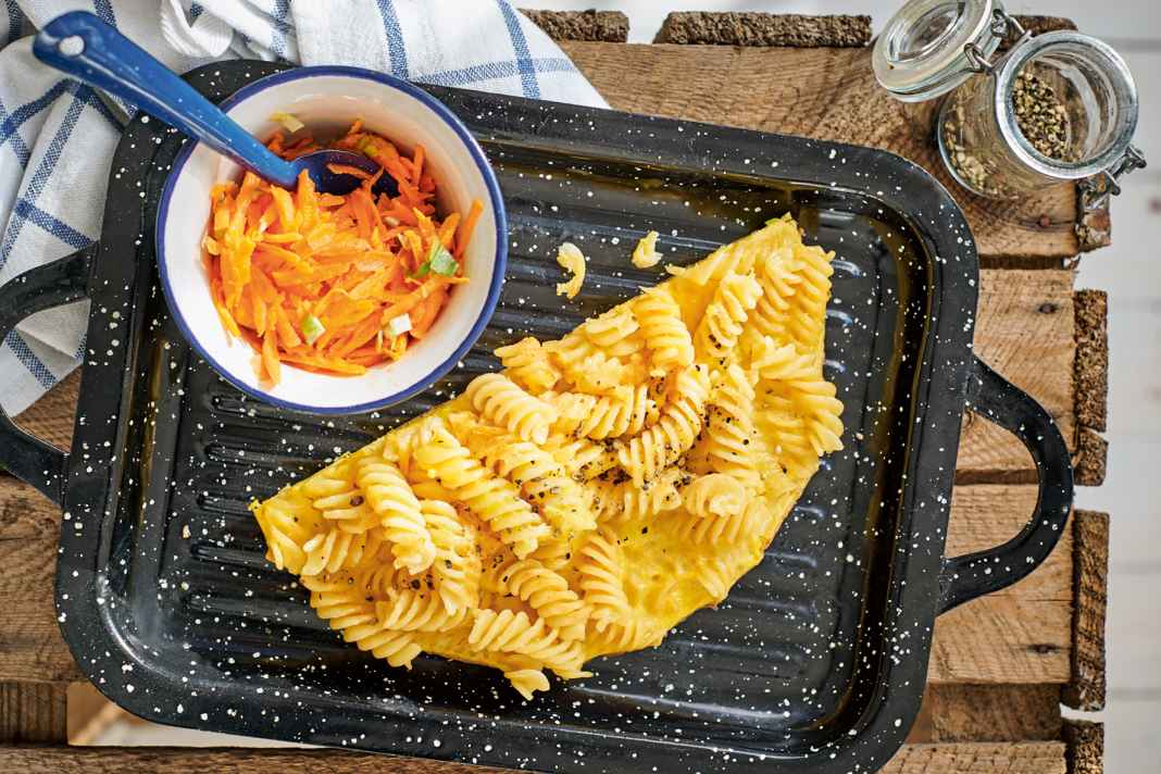 Pasta omelette with carrot salad.