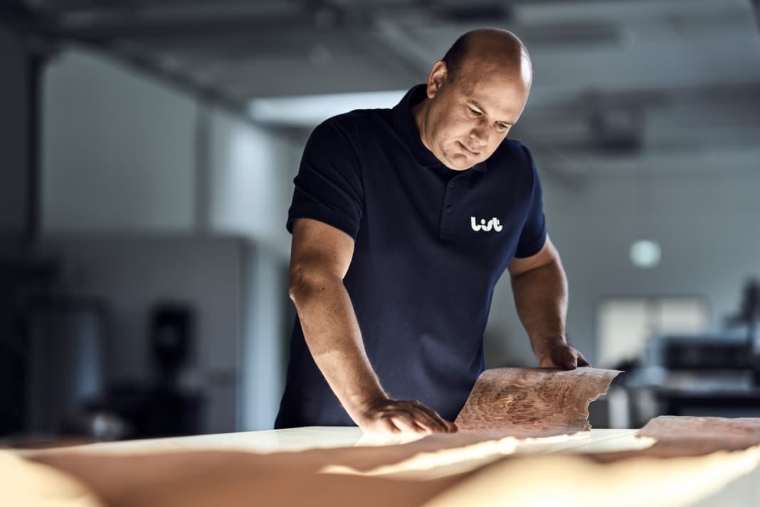 A good eye: Gabor Liptak checks the veneers at List GC. The Austrian family business is proud of its low staff turnover rate
