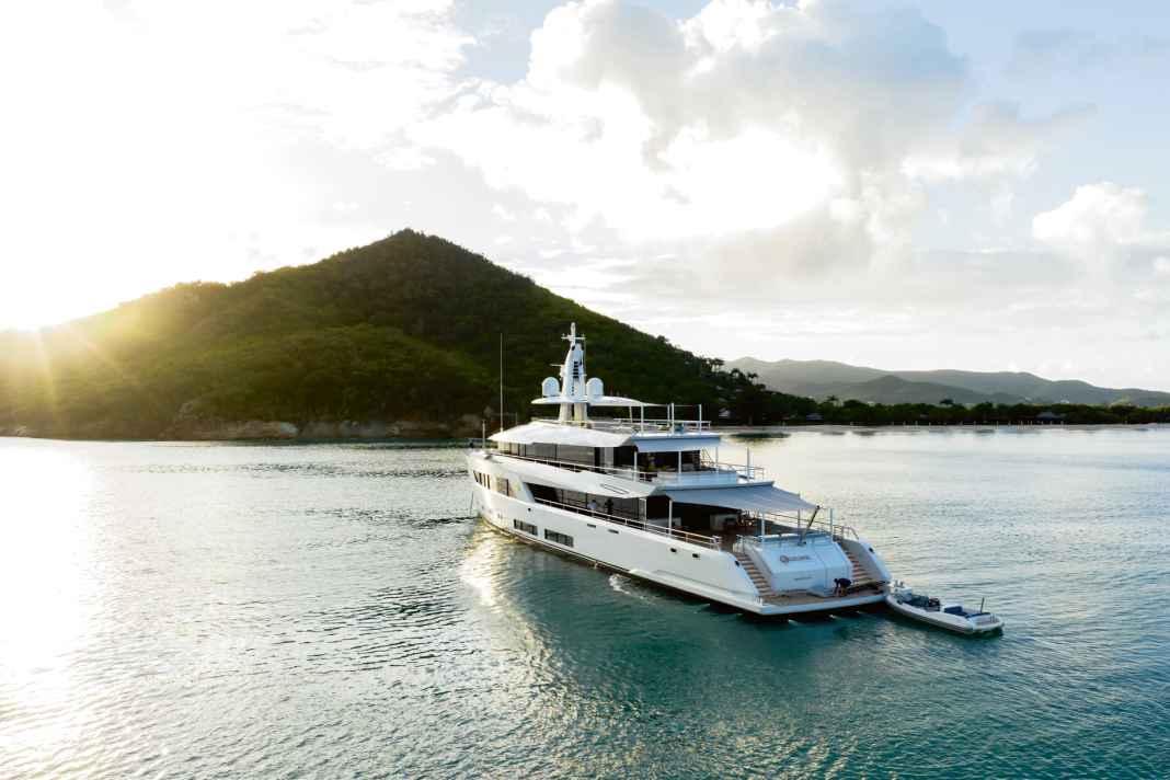 At anchor: "Moon Sand" has spacious decks that are simply shaded by awnings. The tender selection is small but fine.