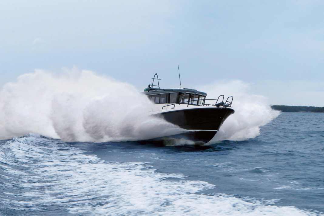 The Sargo 28 Explorer Outboard in the wave. The foredeck stays dry.