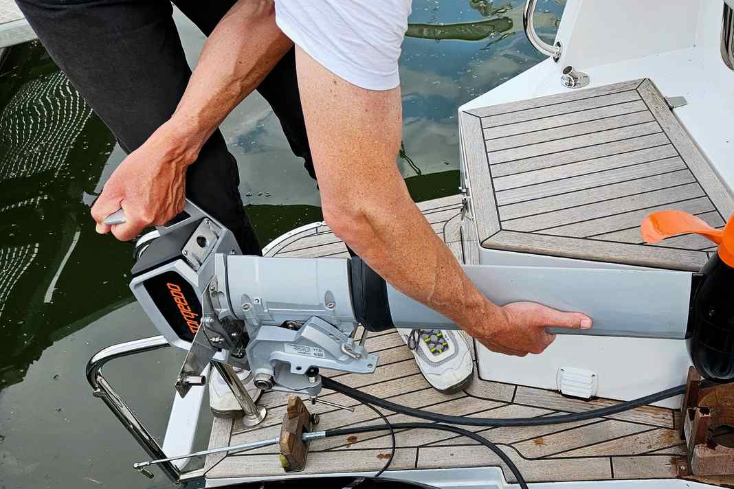 1: When the electric motor is not in use, it can be stored backwards on the rear platform in a wooden holder.