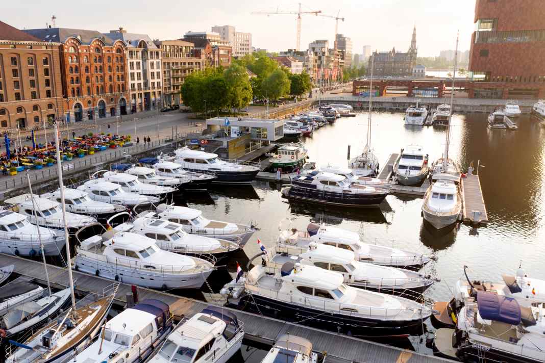 Boathouses in the Port of Antwerp. To mark the club’s 25th anniversary, owners share what they value most about their boathouses.