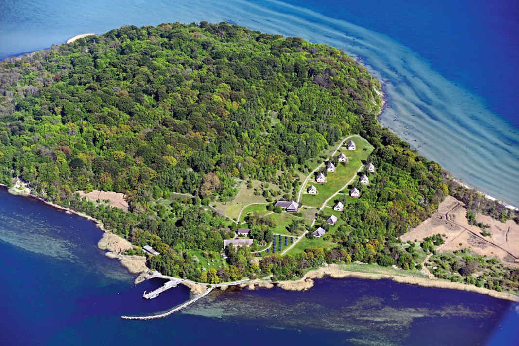 Aerial view of Vilm with jetty and holiday resort.