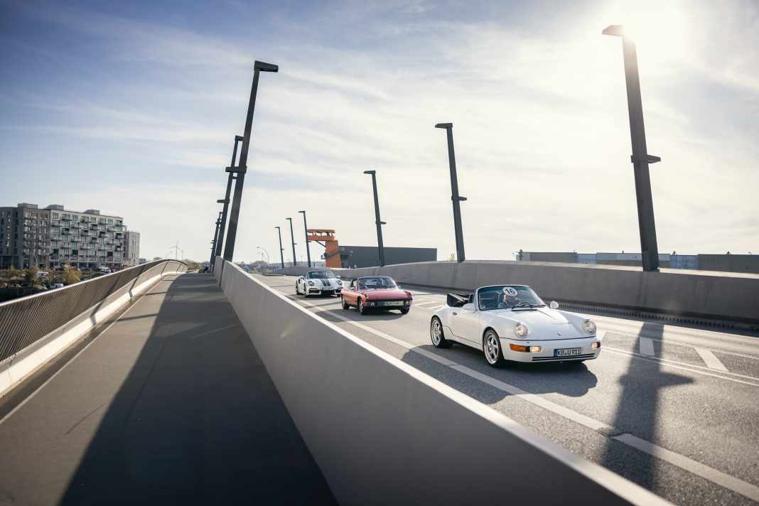 Die Drei von der Baakenhafenbrücke. Porsche-Genuss mit offenem Verdeck in der Hamburger Hafencity.