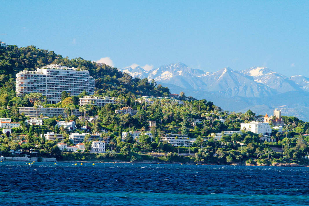 Although the Maritime Alps tower over Cannes, the celebrity city is spared the strong winds - something stand-up paddlers love to hear.