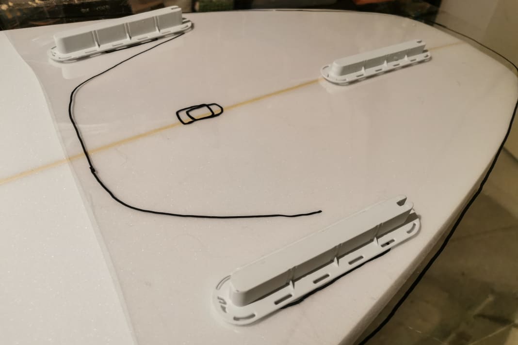 A template helps to indicate the fin boxes. Copied here from existing boards so that the position and angle are correct.