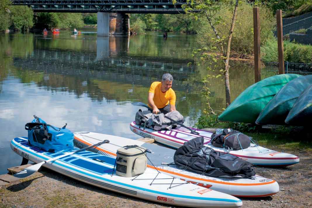 Only inflatable boards are really suitable for a river tour with carrying passages.