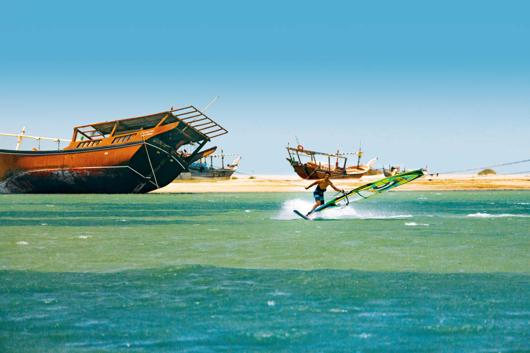 The backdrop in Masirah City is exceptional, as are the surfing conditions with flat water, 35 degree air and 30 degree water