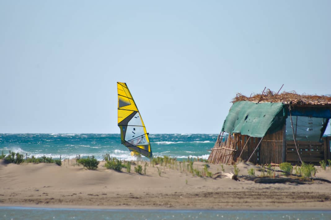 On the windward side of the headland in Tsimari, small waves sometimes run onto the beach.