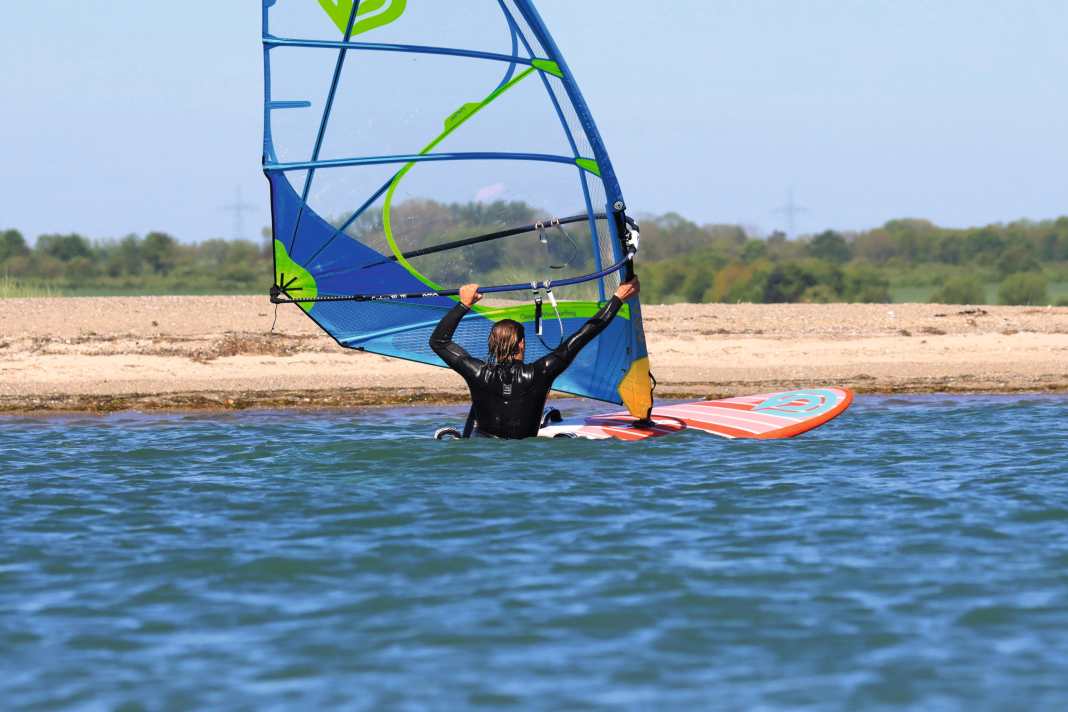 We’ll show you how to get back on your board and make it safely to the beach, even in a gentle breeze!