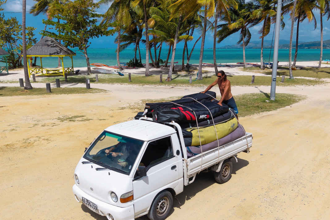 You can keep a protective hand over it yourself until you get to the airport. Only the loaders and the good Lord know what happens to your bag after check-in.