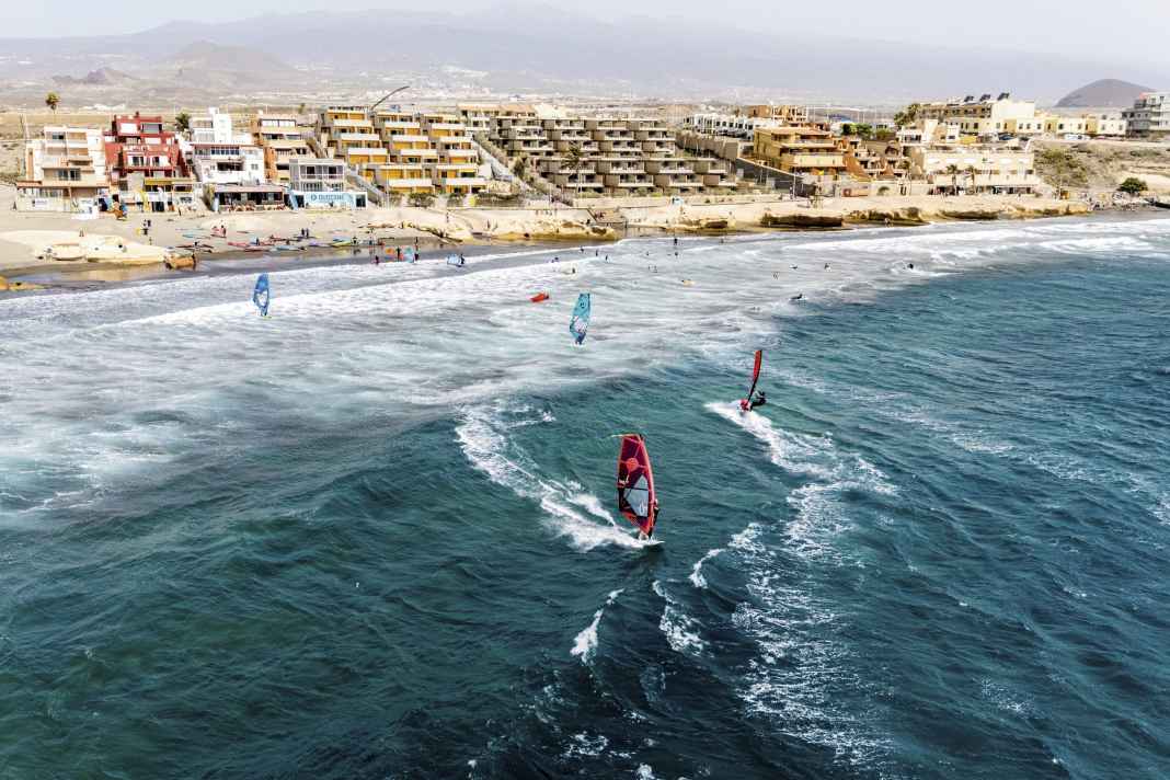 This is where the music plays: surfing centres are lined up at the southern end of Médano Bay.