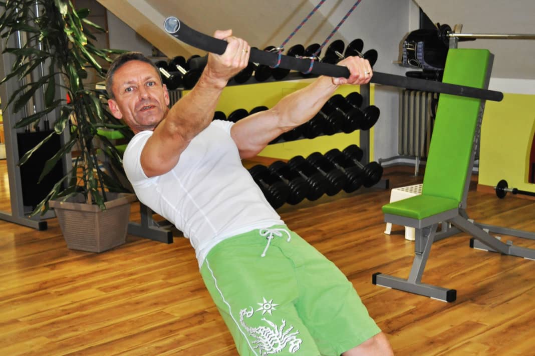 The number 1 surfing exercise!  Grab the boom and do pull-ups. Keep your spine completely still and stretched ...