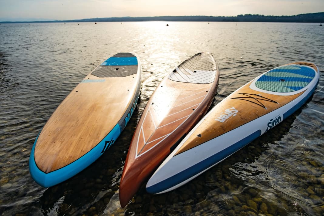 f.l.t.r.: Naish Touring GTW 14'0'' x 30,0'', RRD Retro Wood GT 14'0'' x 28,3'', Siren Wahoo RC 14'0'' x 27,5''