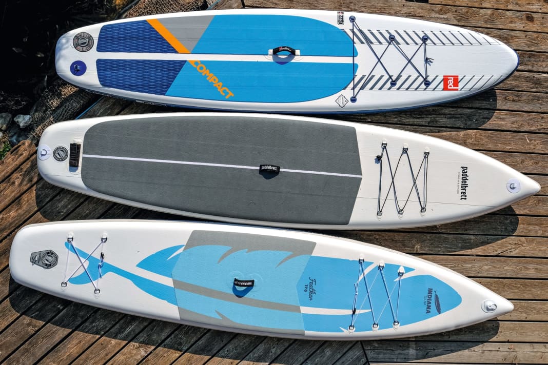 von oben nach unten: Red Paddle Compact Set 11’0” x 32,0’’, Indiana Feather 11,6’’ x 30,0’’, Paddelbrett Touring Paket 11’8” x 32,0’’