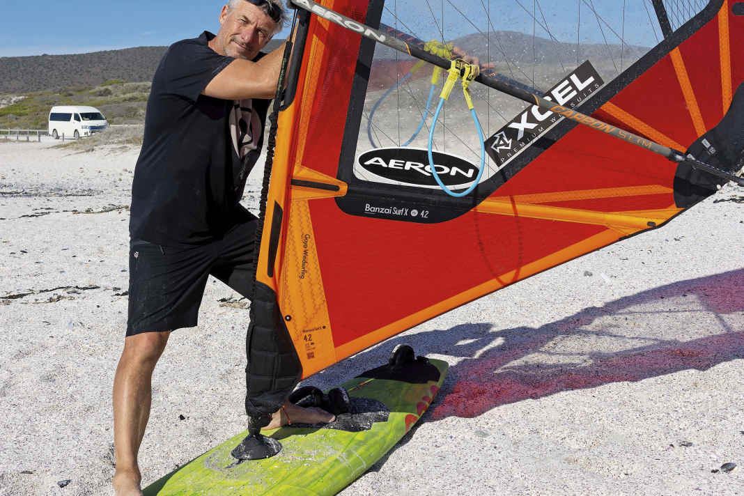 By taking a big step towards the bow...