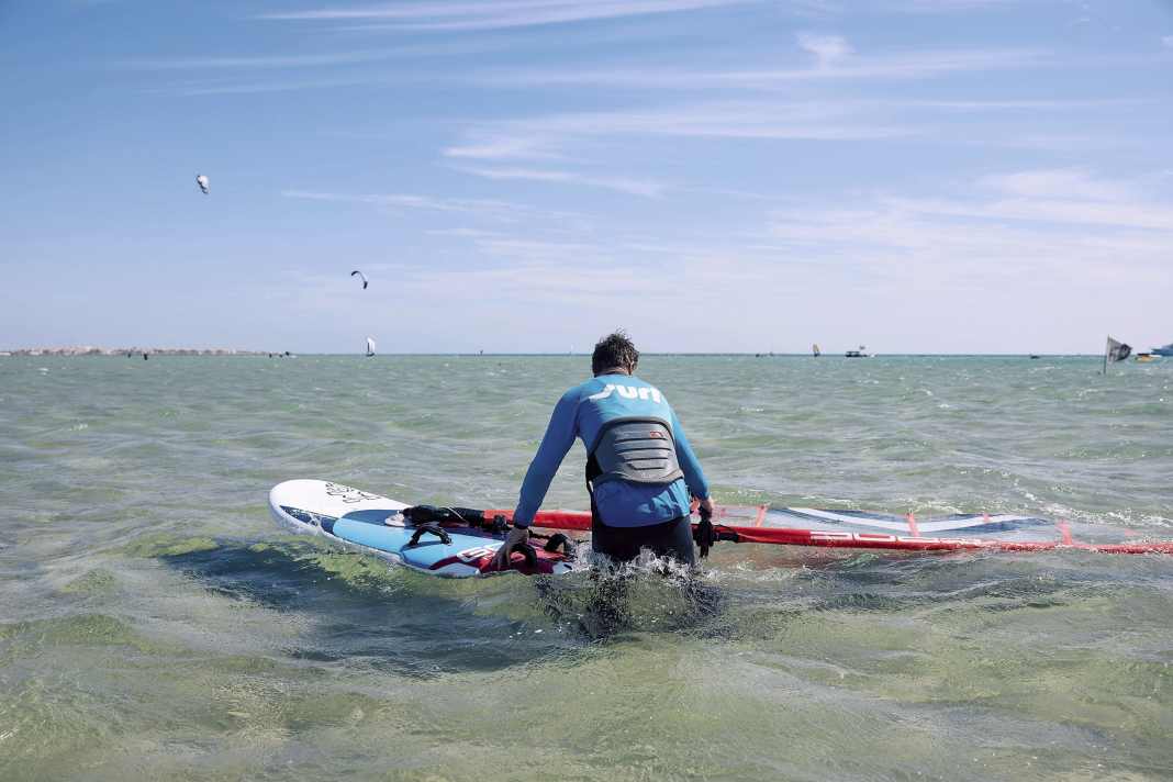 At the beginning, set your board on a half-wind course (across the wind)...