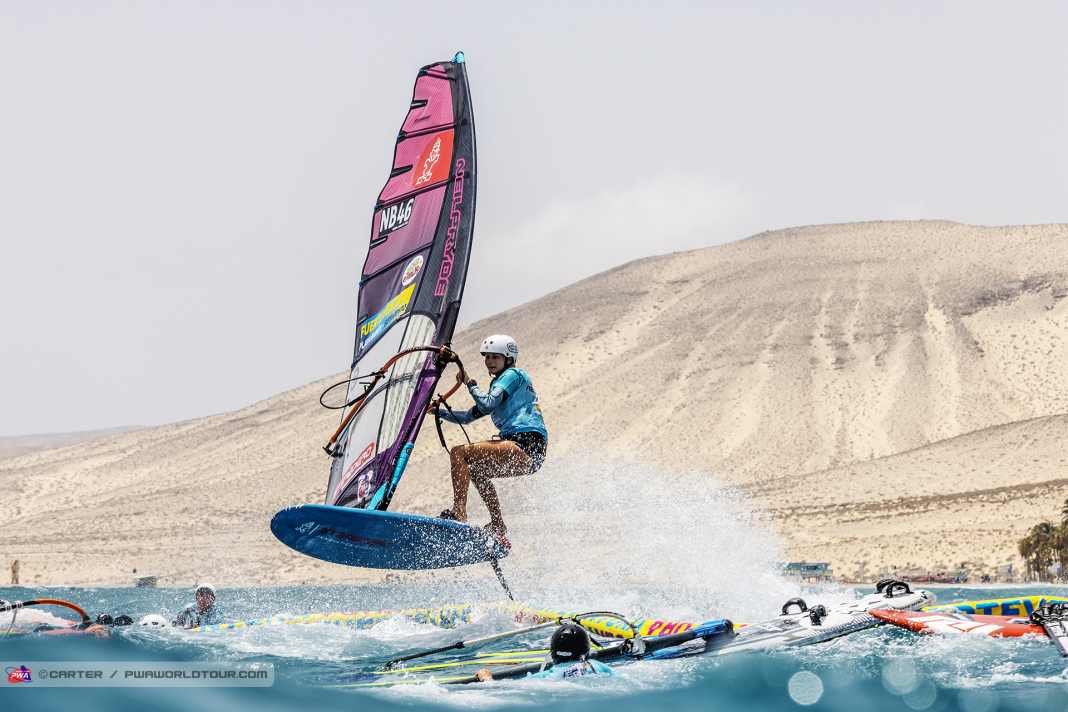 Just 14-year-old Bobbi-Lynn de Jong jumps through the centre. You can find the clip in the article.