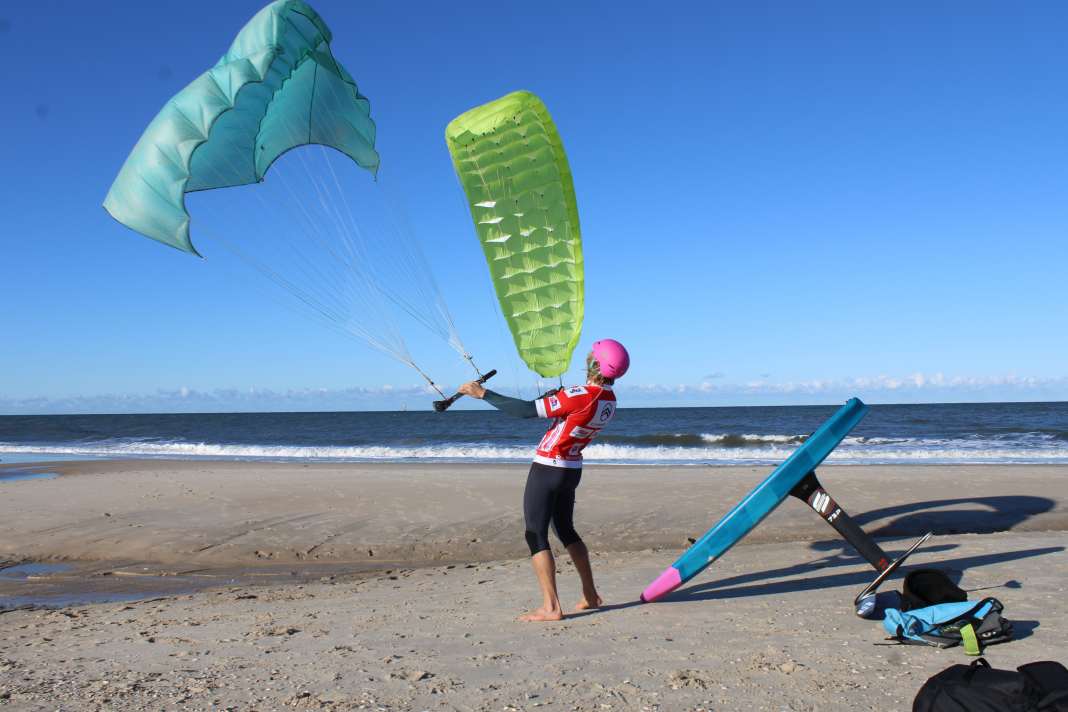 Balz with his first self-built para-wing (left) and a preliminary stage of the current prototypes