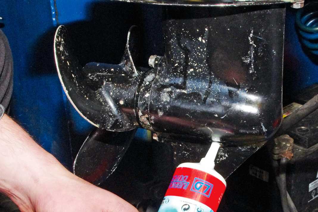 Place the tube on the drain plug and press in the oil until ...