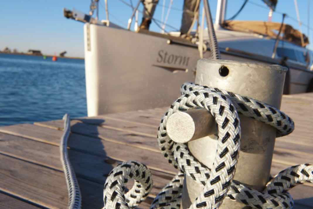 Mooring lines in use. The eyes of most prefabricated lines are designed for the cleats on board. They are too small to be placed over a bollard