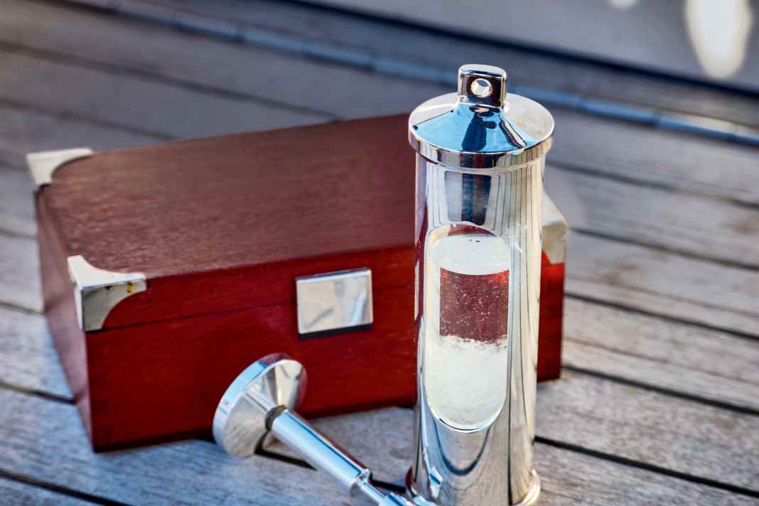 A storm glass, also known as a FitzRoy storm glass or camphor glass. It is claimed that the chemical changes herald storms or bad weather fronts, but a study by chemists at the University of Duisburg-Essen was unable to confirm such suitability for weather forecasting.