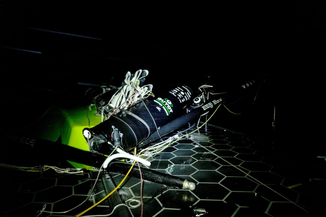 The overturned mast on board "Guyot"