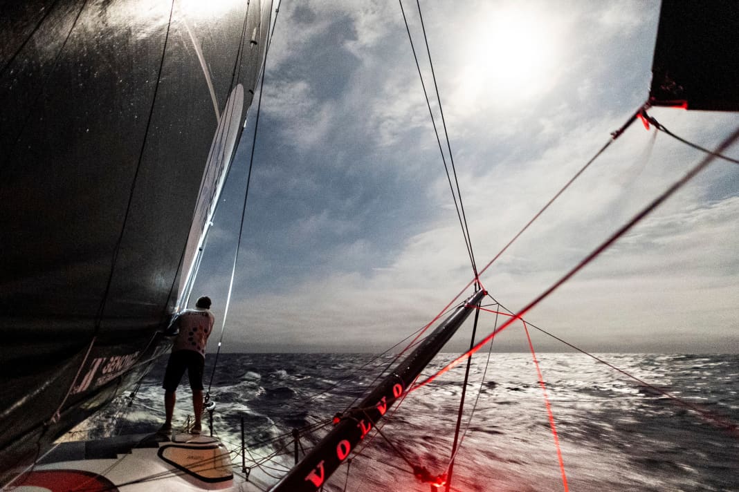 In the light of the full moon: Jack Bouttell on the foredeck of 11th Hour Racing