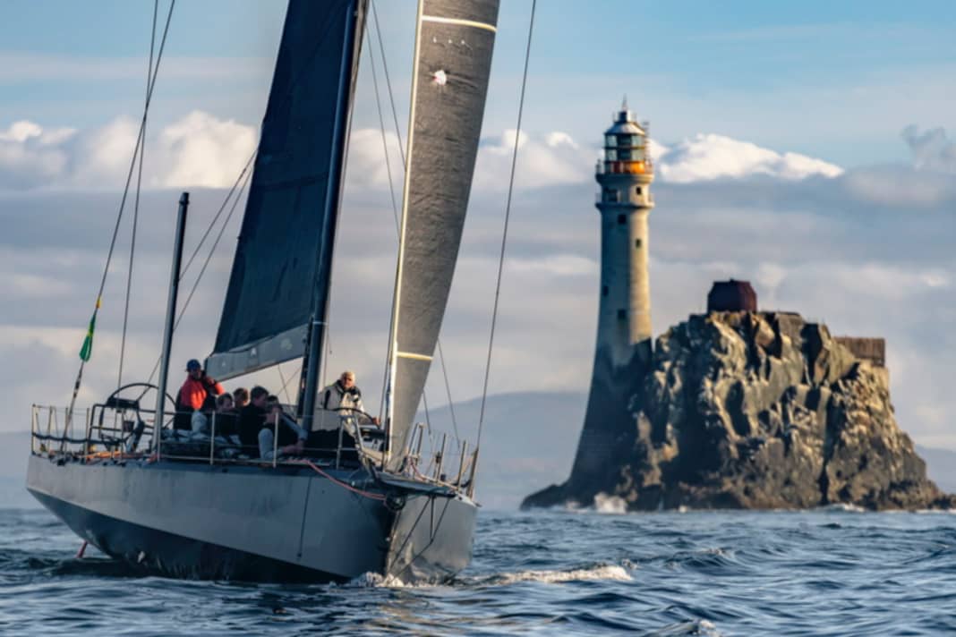 Here, Jens Kellinghusen's Ker 56 "Varuna" rounds off the famous Fastnet rock