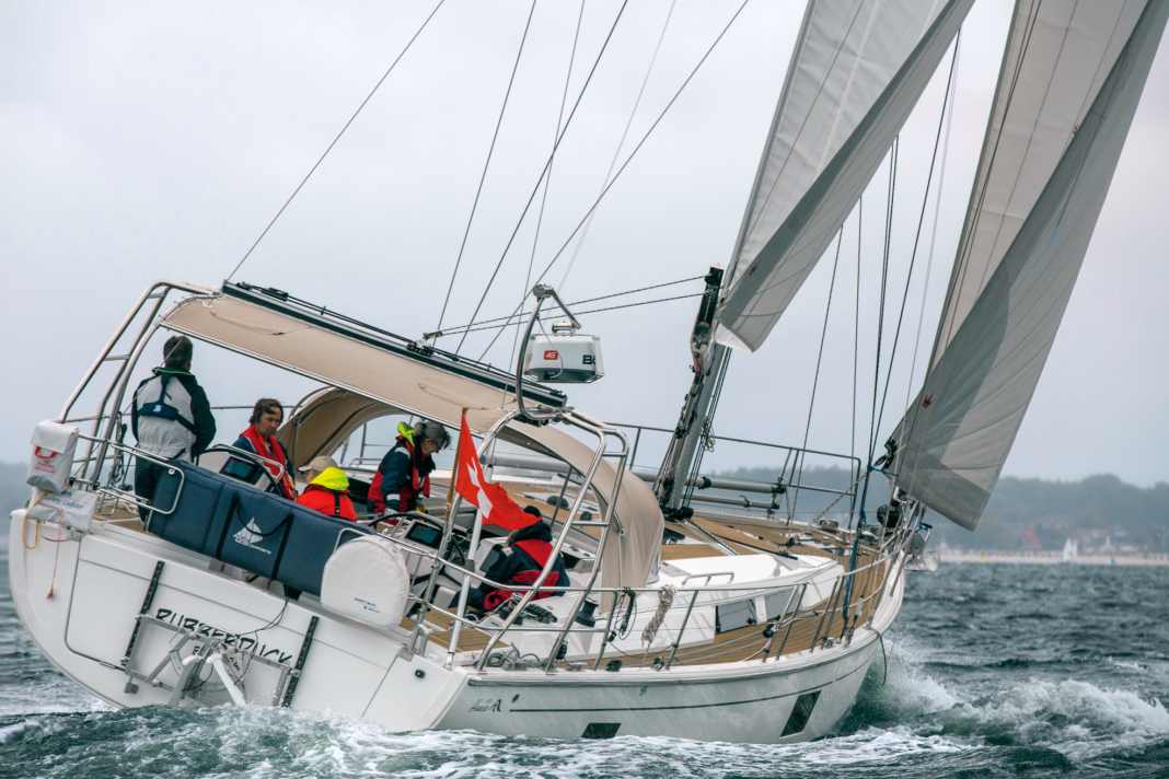The tare bracket holds the electric traveller and removes the mainsheet from the cockpit