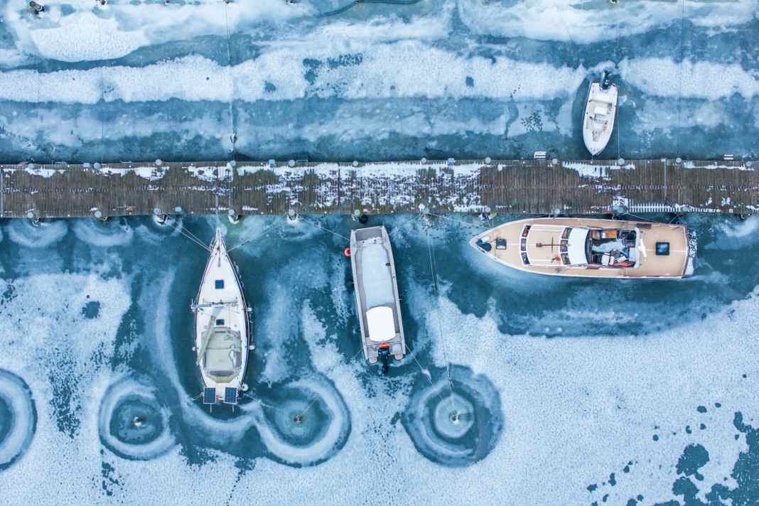 Boats stuck in the ice at the jetty on the island of Poel.