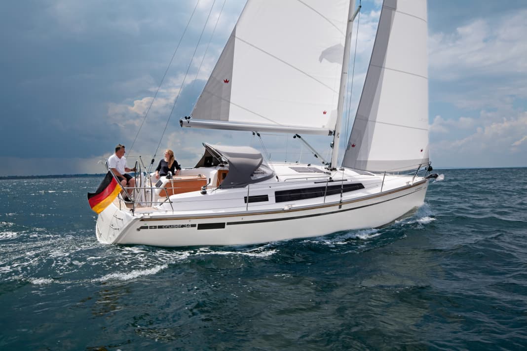 Modified deck, two wheels. The backstay gets in the way if you want to steer sitting upwind