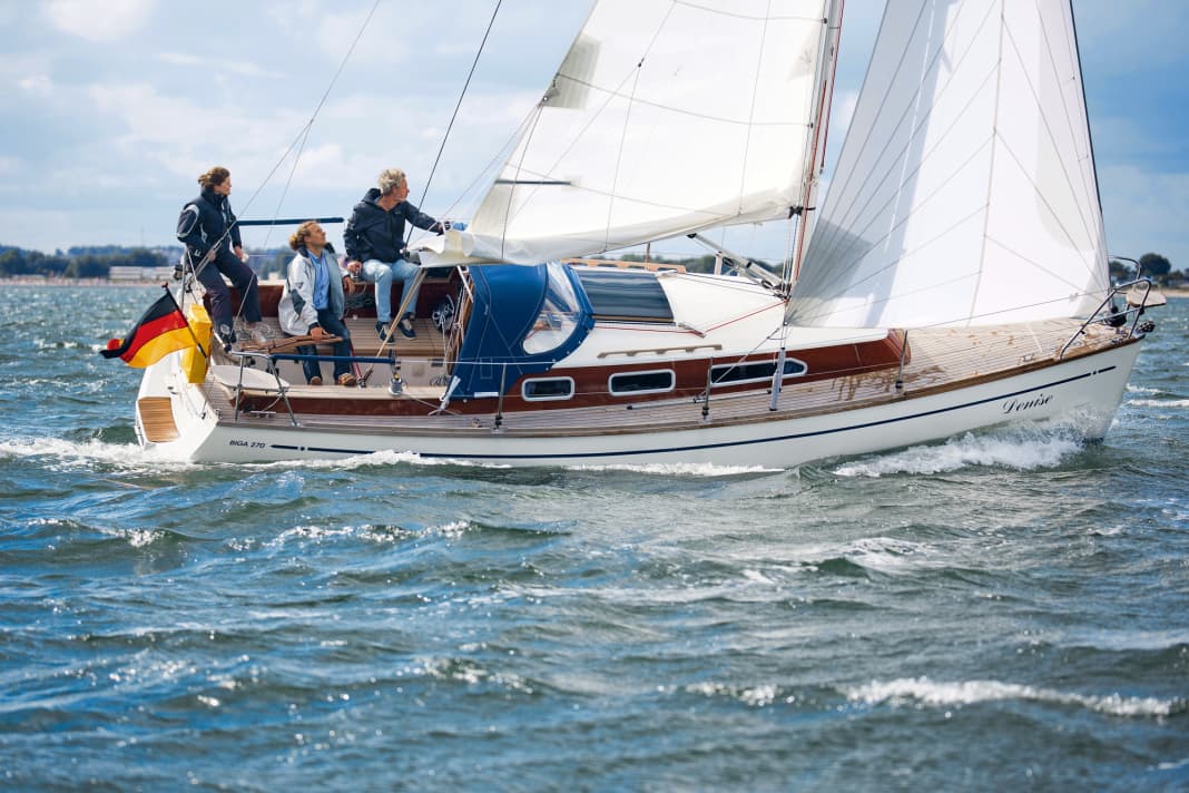 Wooden superstructure with classic windows, modern hull: a boat from two worlds