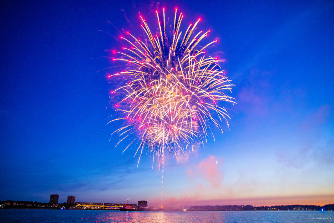 The fireworks display over the fjord marked the halfway point of the world's largest sailing week
