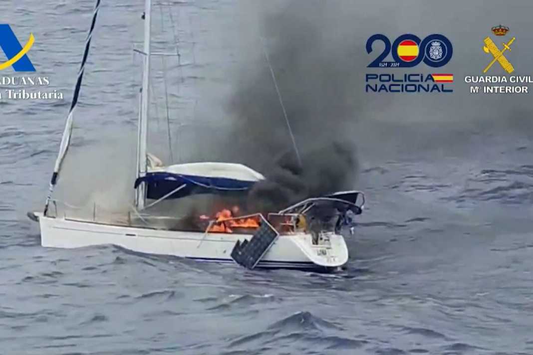 The yacht catches fire again and sinks.