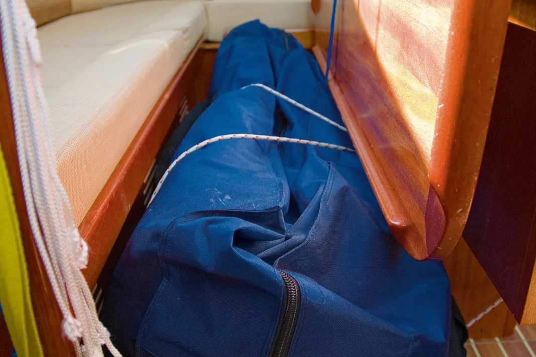 Below deck, the dinghy often blocks the footwell