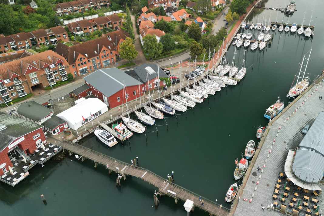 An aerial view of the site on Eckernförde Bay; the harbour has space for 35 permanent berths and five guest berths. The red buildings house a well-stocked equipment shop.