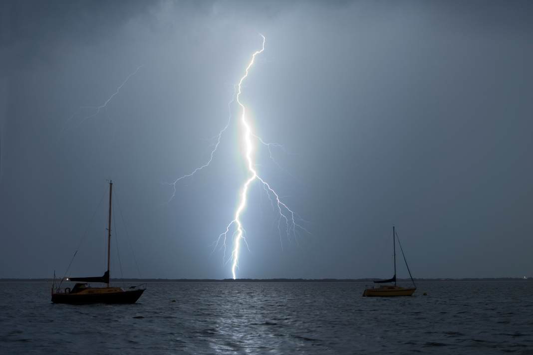 Lightning strikes near some yachts