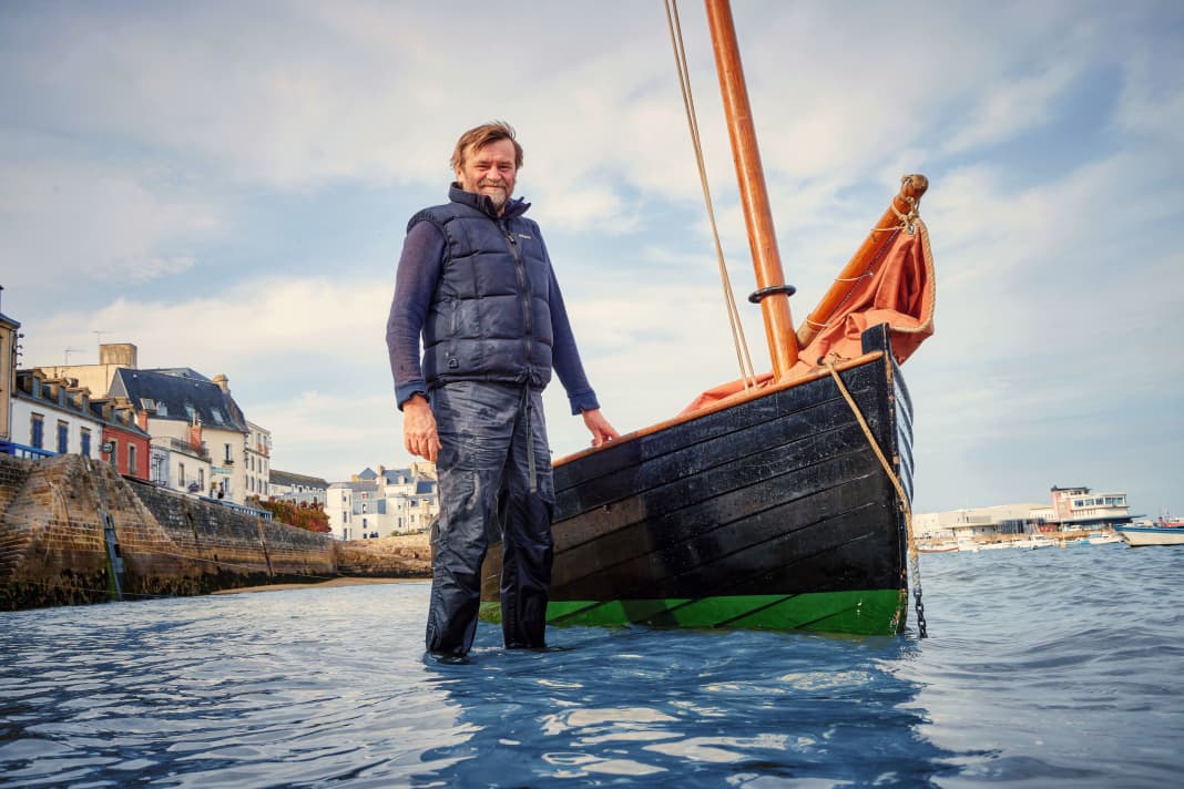 Exiled Brit Roger Barnes in front of his Ilur "Avel Dro" in its home port of Douarnenez