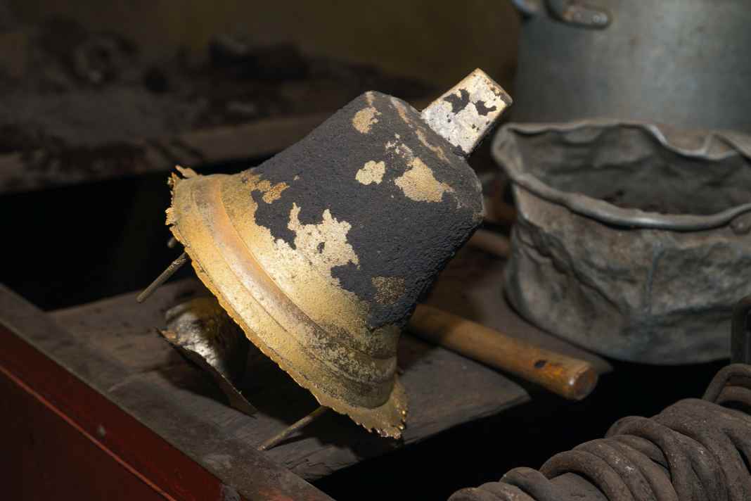 A bell that was first cooled after casting and then knocked out of the mould.