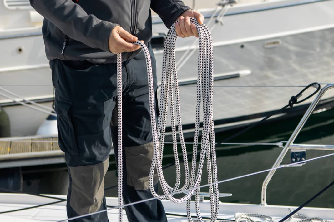 In the holding hand, in this case the left hand, the working hand is used to place alternating bights forwards and backwards